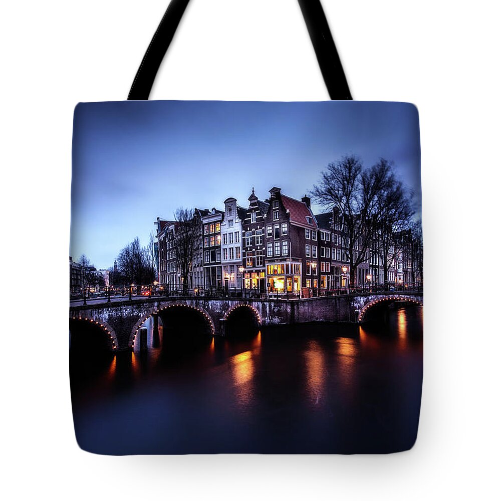 Holland Tote Bag featuring the photograph Amsterdam by Jorge Maia