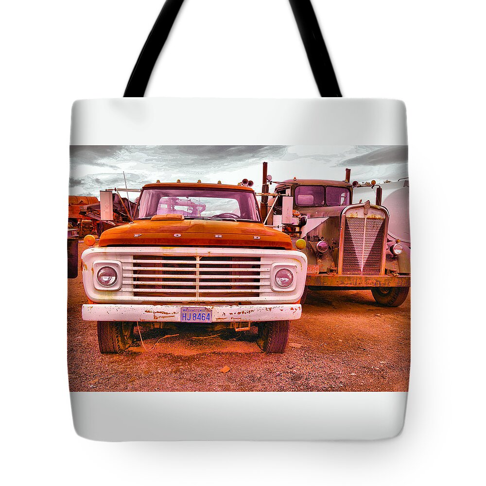 Trucks Tote Bag featuring the photograph An old ford and kenworth by Jeff Swan