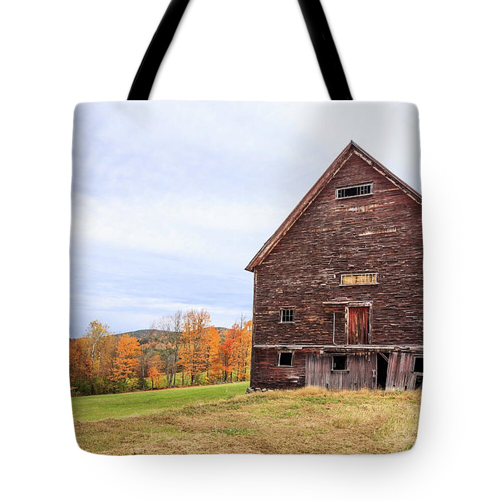 Barn Tote Bag featuring the photograph An old wooden barn in Vermont. by Edward Fielding