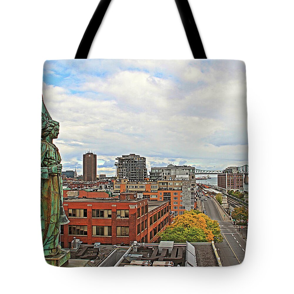 Angel Statue Tote Bag featuring the photograph Angel of Old Montreal by Alice Gipson