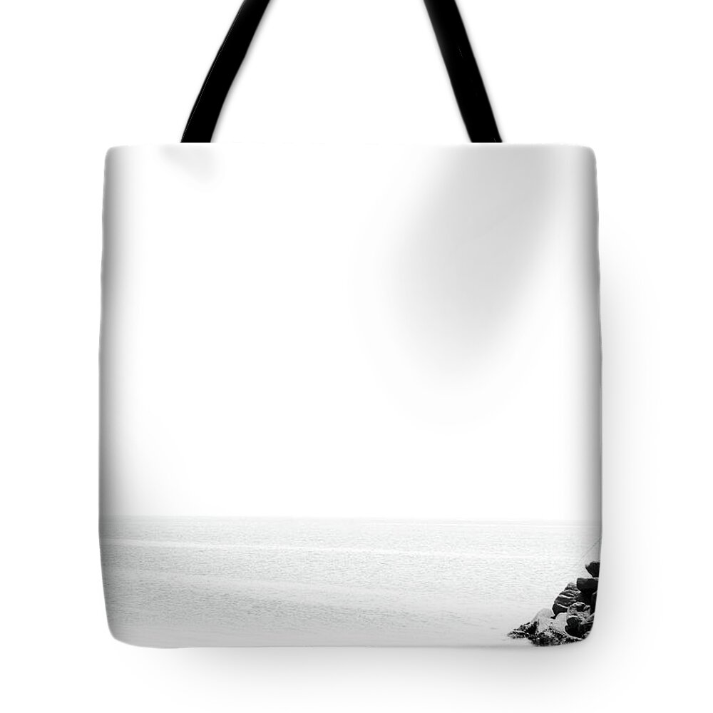 Angler Tote Bag featuring the photograph Angler by Aya