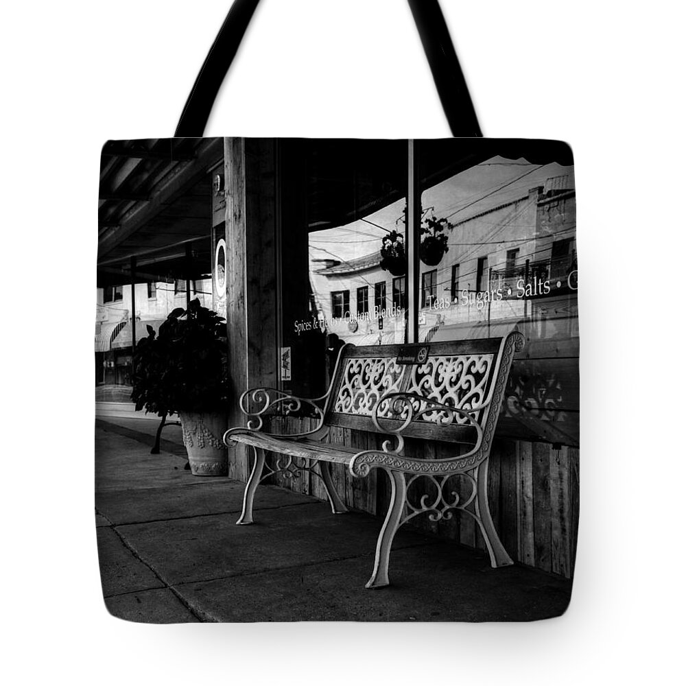 Blackandwhite Tote Bag featuring the photograph Antique Bench Black And White by Ester McGuire