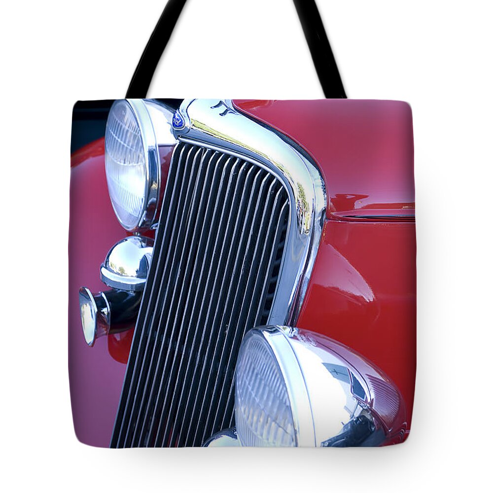 Hood Tote Bag featuring the photograph Antique Car Hood Ornament by Brian Kinney
