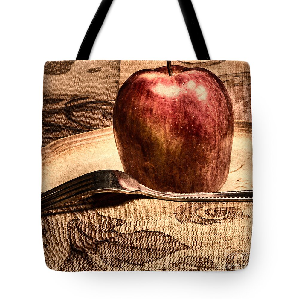 Apple Tote Bag featuring the photograph Apple by Lawrence Burry