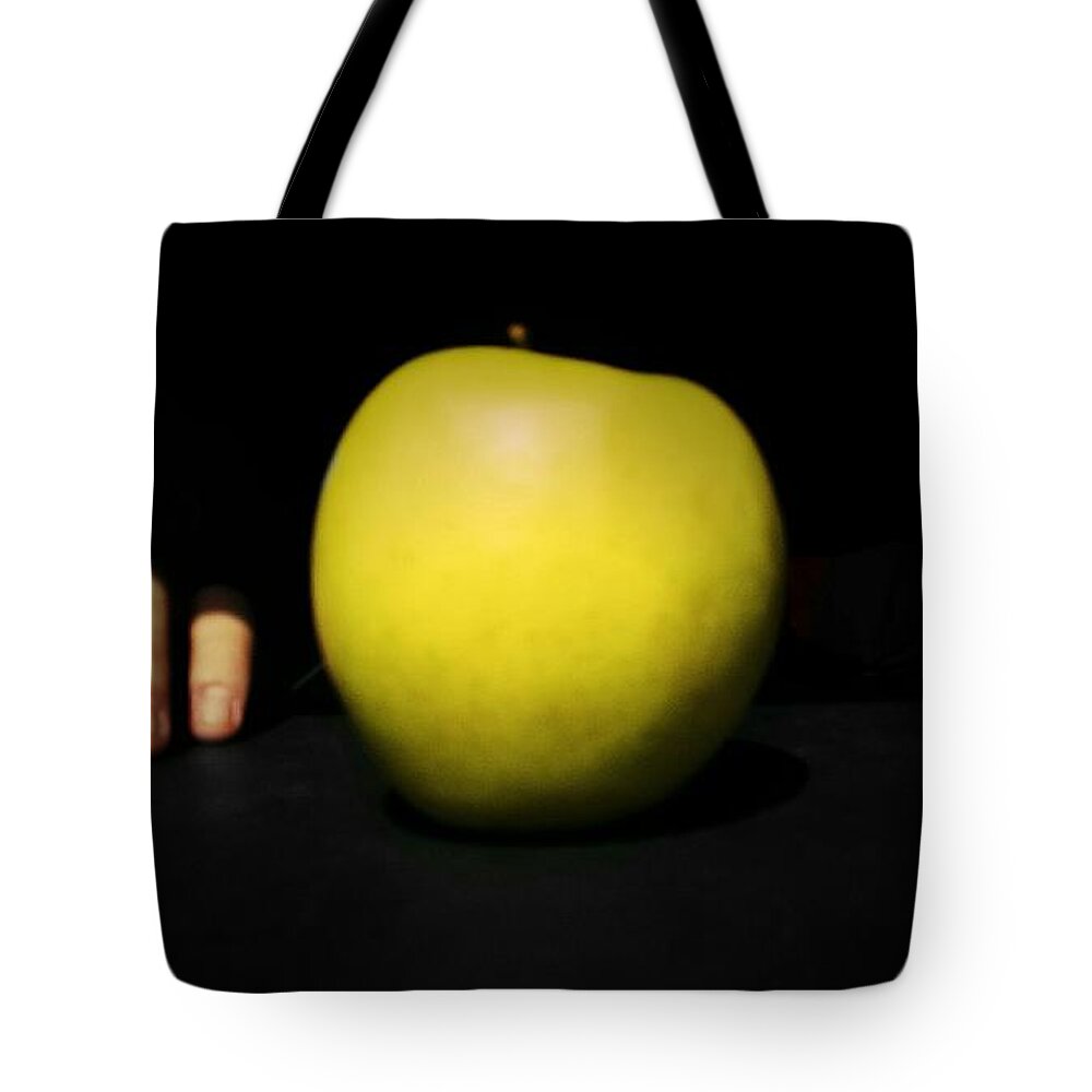 Black Tote Bag featuring the photograph Apple's nightmare by Cristhian Diaz