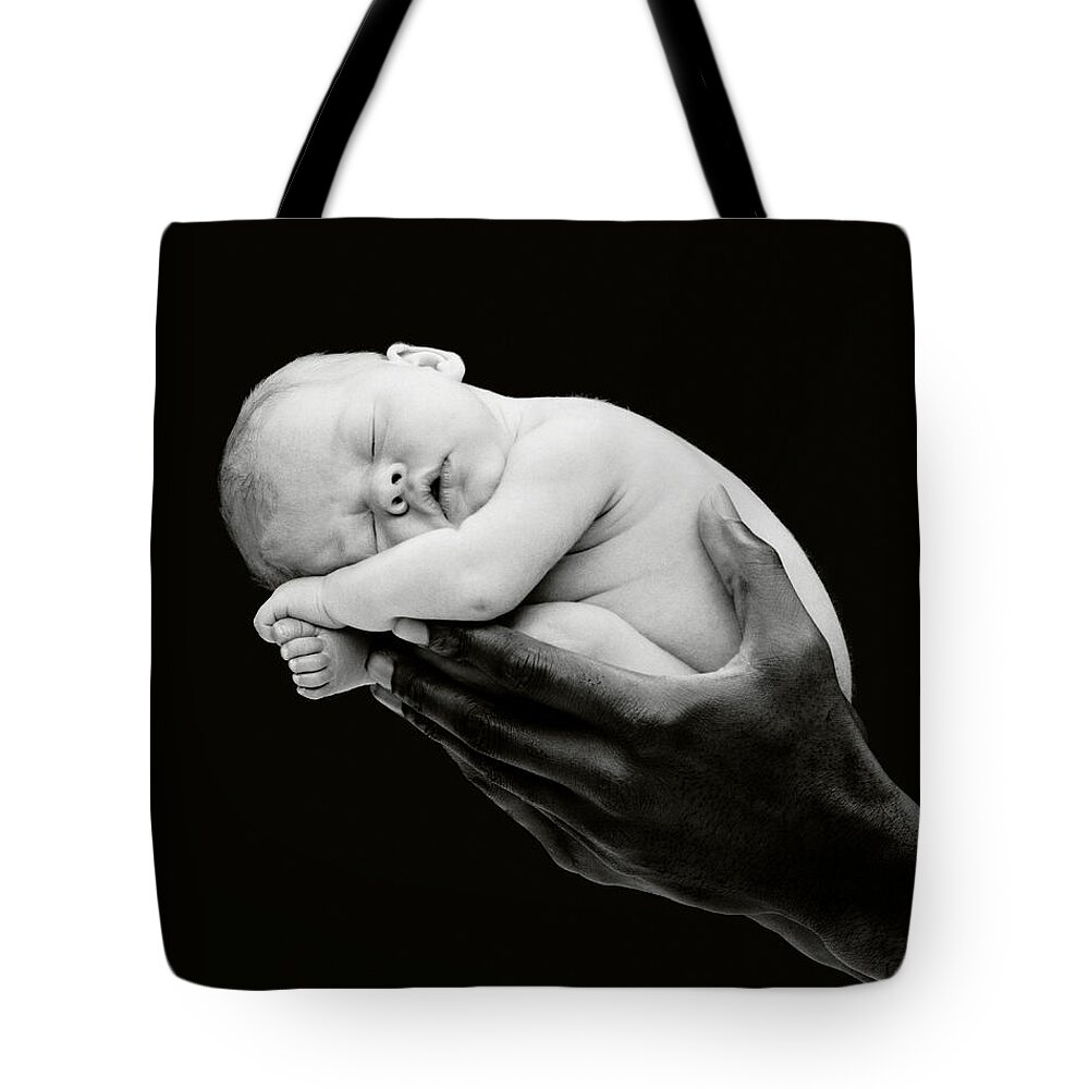 Black And White Tote Bag featuring the photograph Tony holding Georgia by Anne Geddes