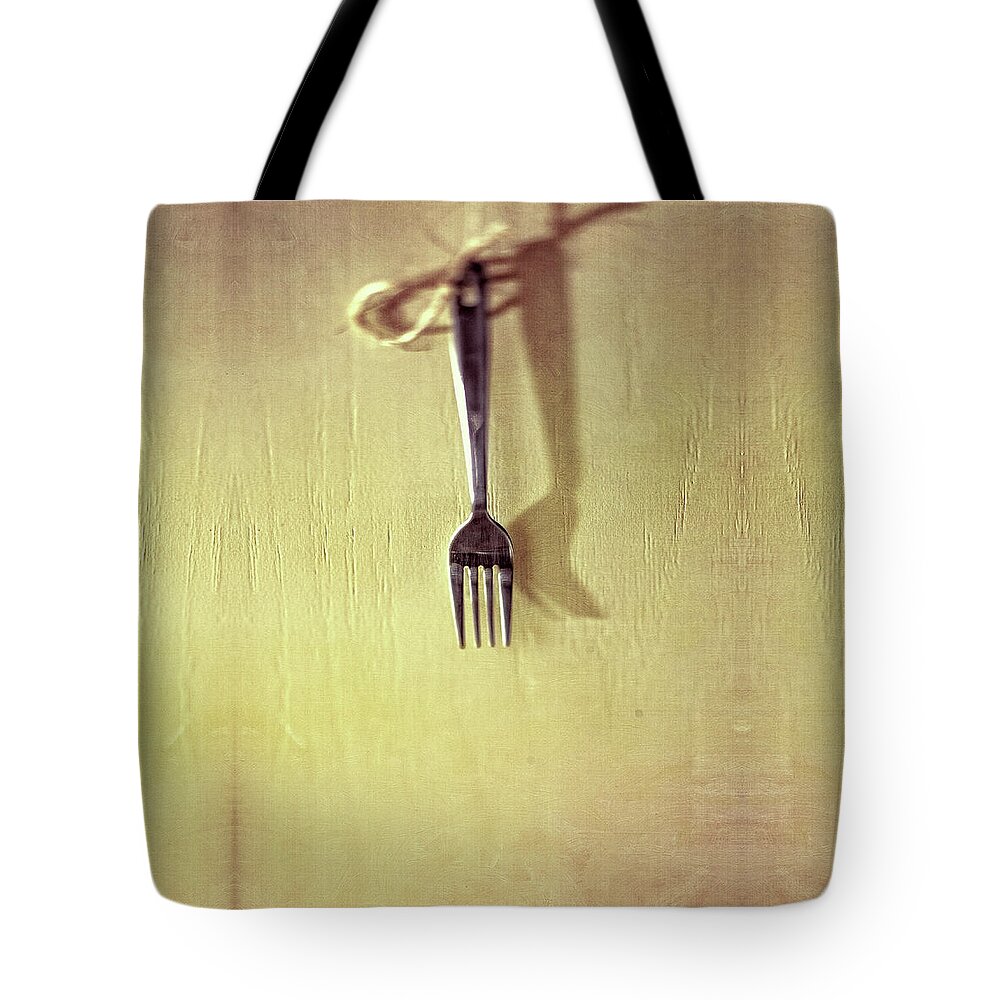 Cooking Tote Bag featuring the photograph Hanging Fork on Jute Twine by YoPedro
