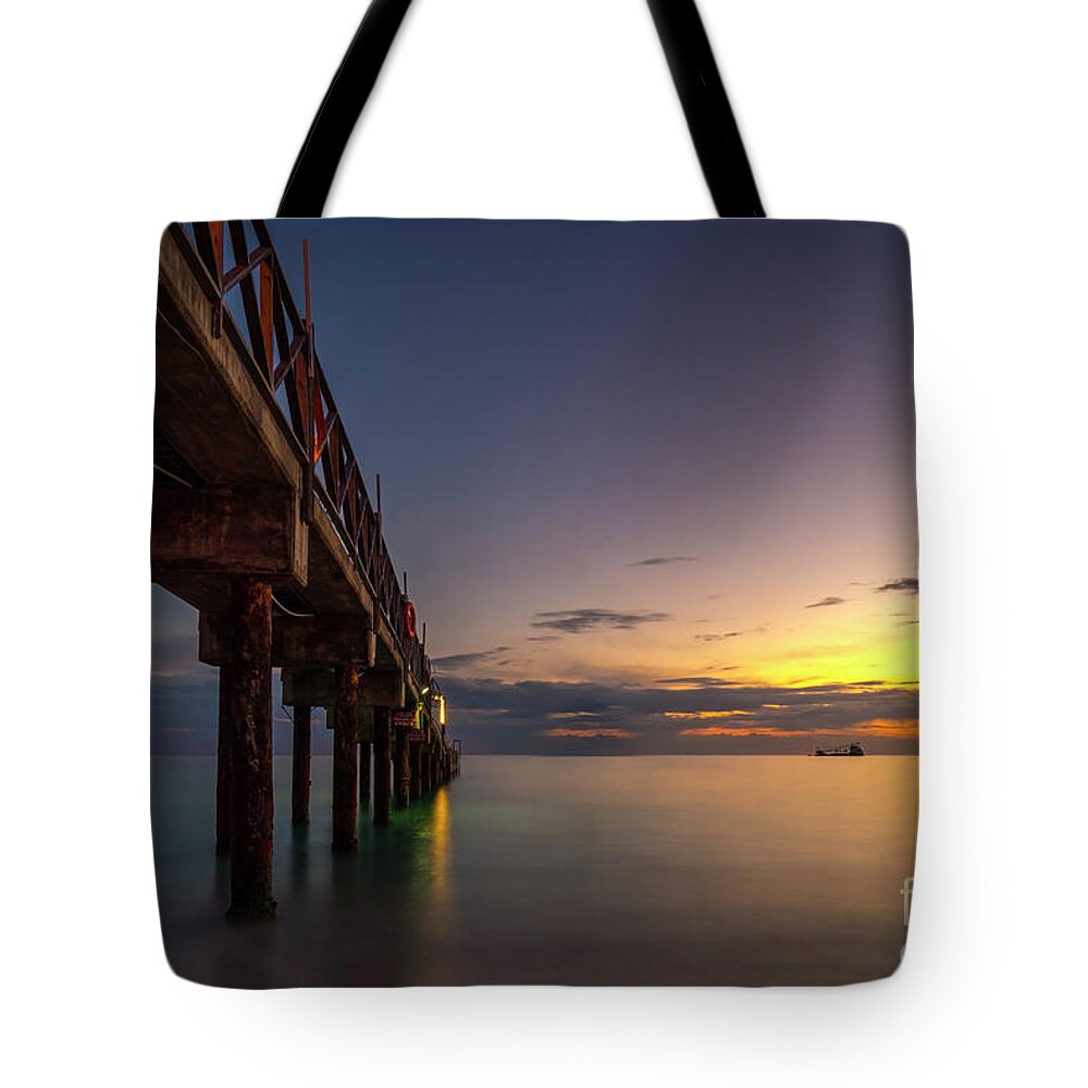  Tote Bag featuring the photograph As The Sun Goes by Hugh Walker