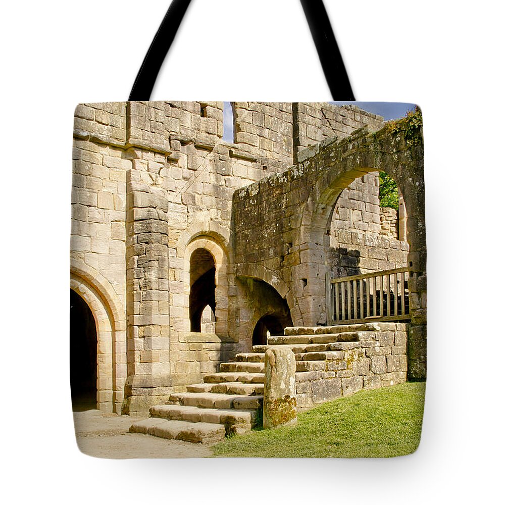 Fountains Abbey Tote Bag featuring the photograph At the entrance to the vaults. by Elena Perelman