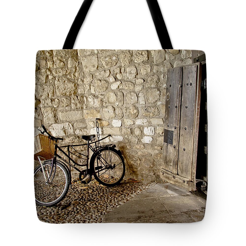 Bike Tote Bag featuring the photograph At the old wooden gate. by Elena Perelman