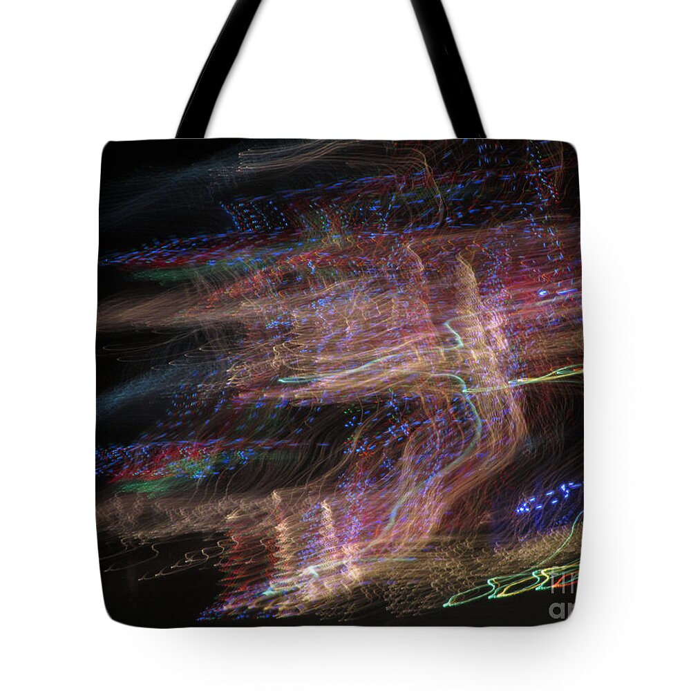Neon Tote Bag featuring the photograph Aurora by Cassandra Geernaert