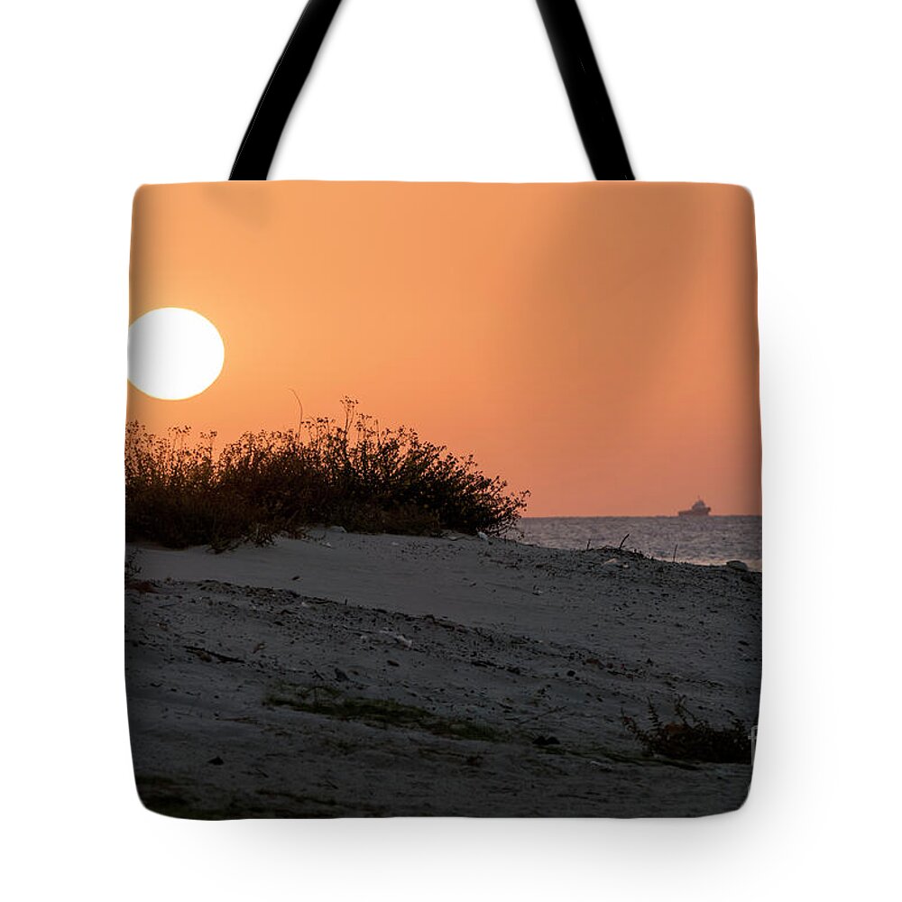 Sunset Tote Bag featuring the photograph Autumn sunset by Arik Baltinester
