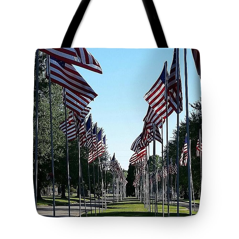 American Flag Tote Bag featuring the photograph Avenue of flags by Kimberly W