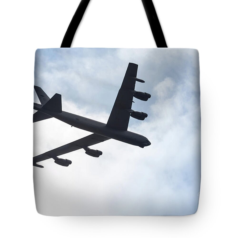 Airshow Tote Bag featuring the photograph B-52 Flyover by Lawrence Burry