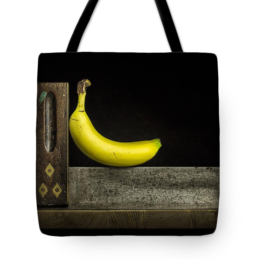 Banana Tote Bag featuring the photograph Bananas ain't square by Nigel R Bell