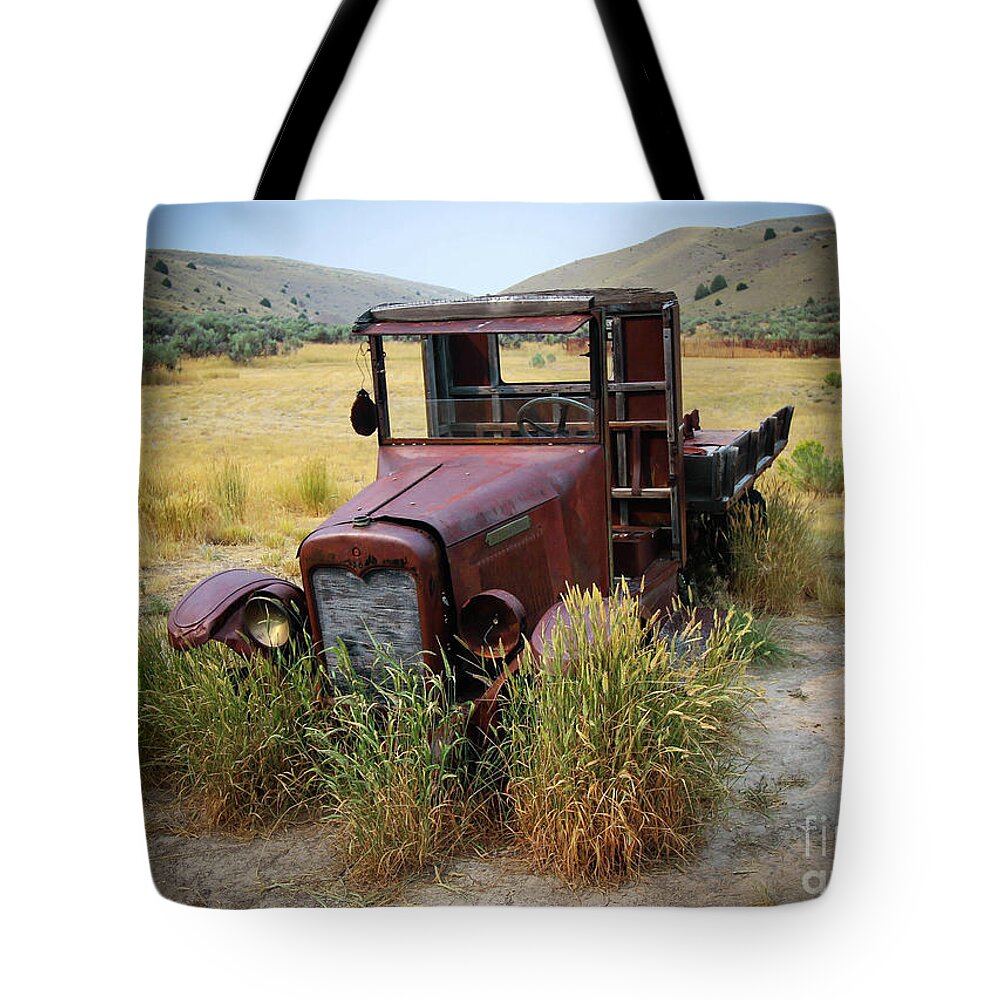 Bannack State Park Tote Bag featuring the photograph Bannack Montana Old Truck Two by Veronica Batterson