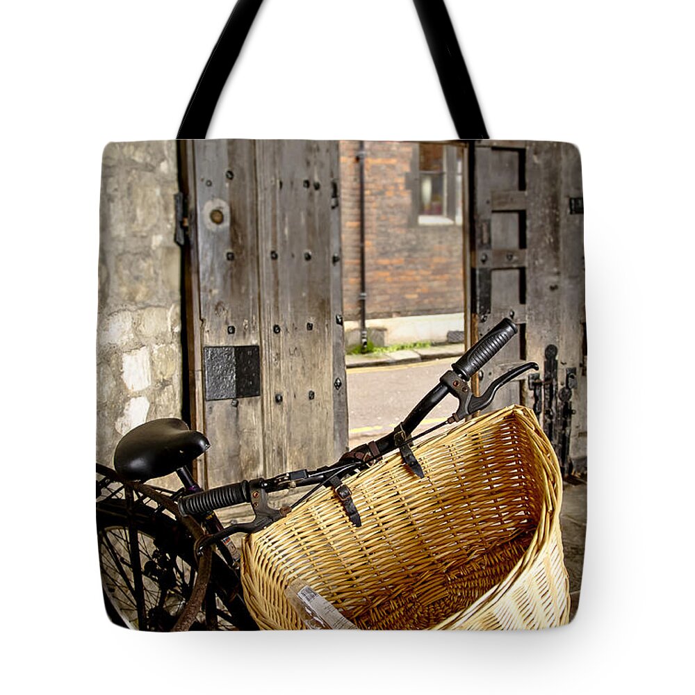 Bike Tote Bag featuring the photograph Basket for a bike. by Elena Perelman