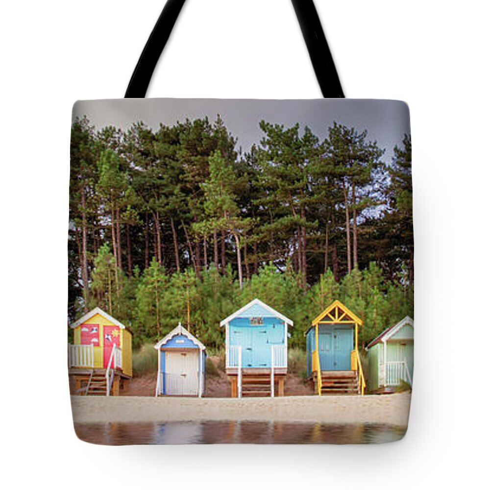 Wells Tote Bag featuring the photograph Beach hut row on the Norfolk coast by Simon Bratt