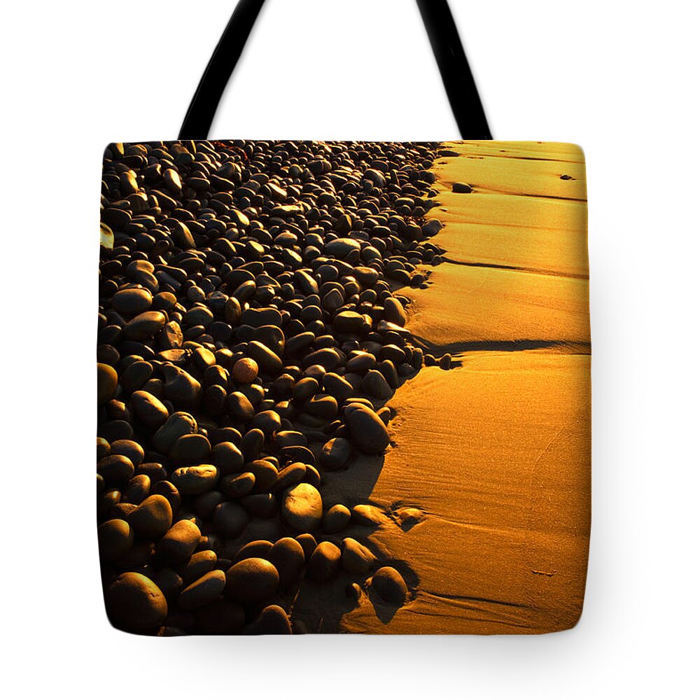 Sunrise Tote Bag featuring the photograph Beach Stones At Sunrise by Irwin Barrett