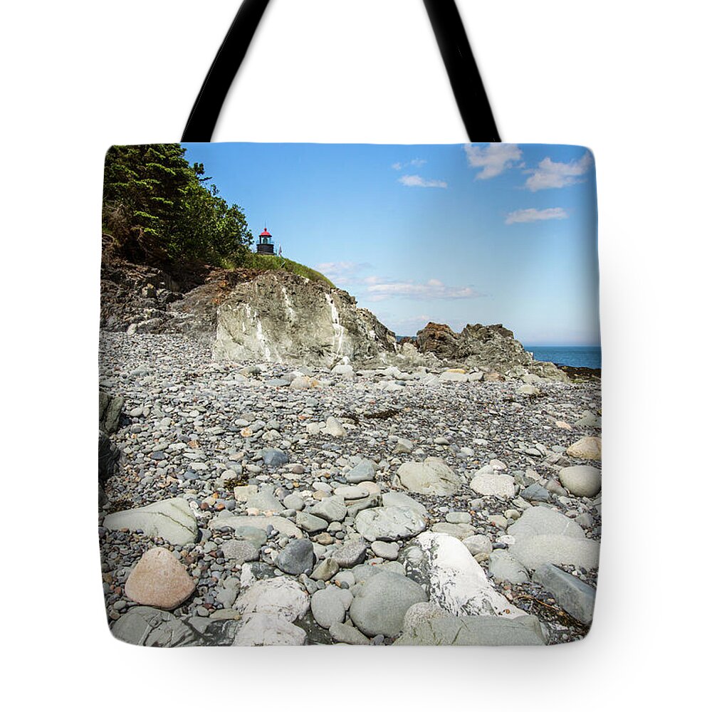 West Quoddy Head Light Tote Bag featuring the photograph Beach view of West Quoddy Head by Alana Ranney