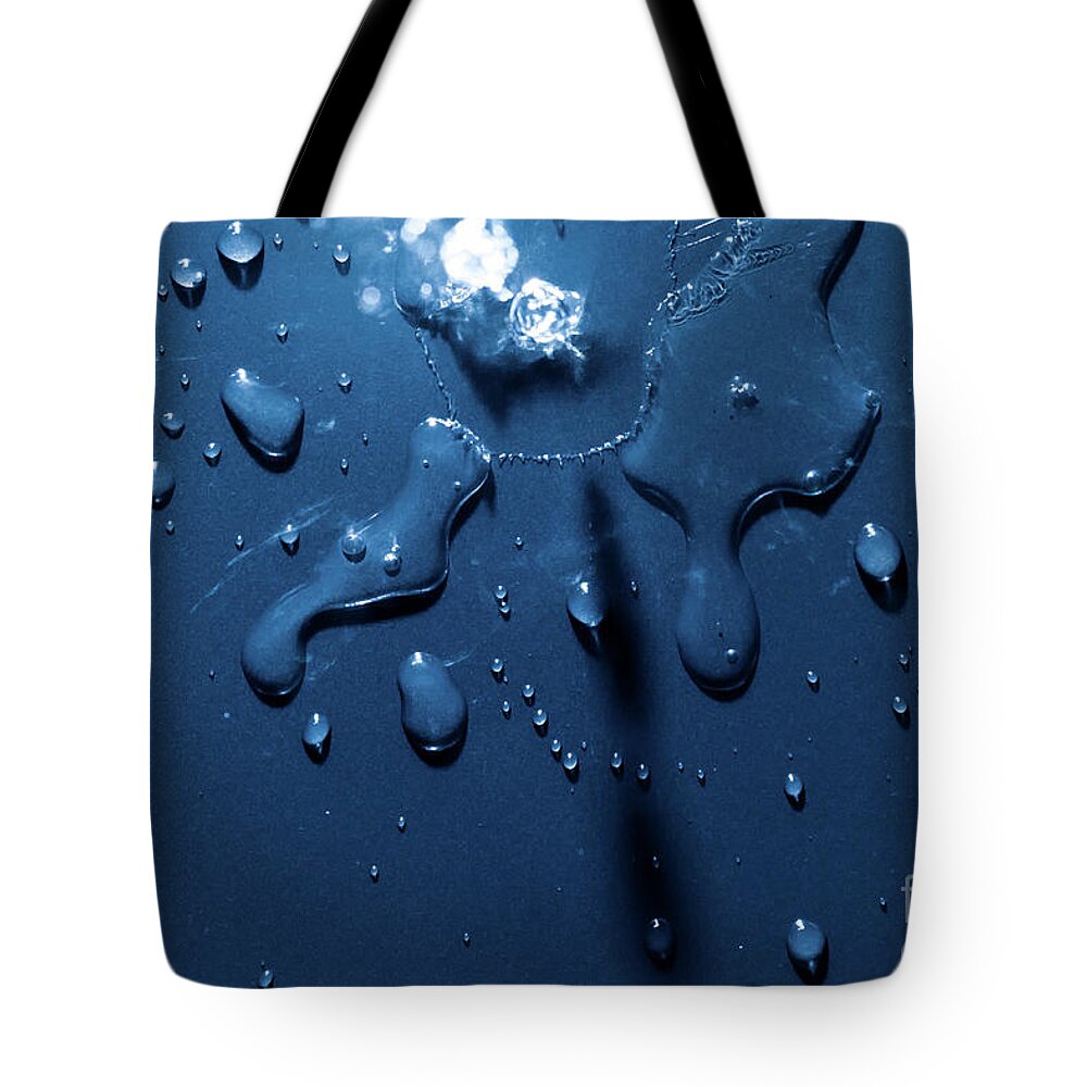 Splash Tote Bag featuring the photograph Beautiful water splashes viewed from above by Simon Bratt