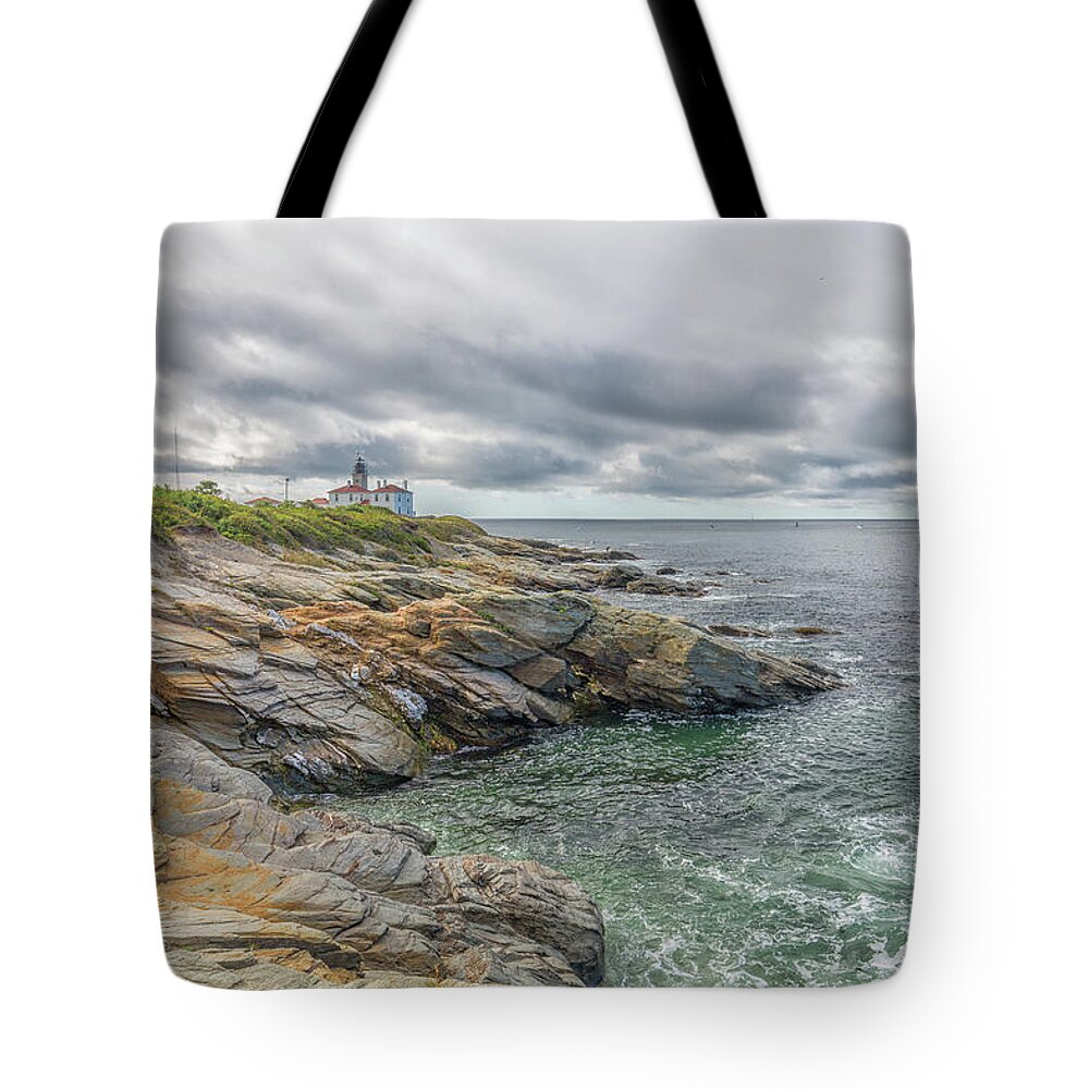 Beavertail Lighthouse On Narragansett Bay Tote Bag featuring the photograph Beavertail Lighthouse on Narragansett Bay by Brian MacLean