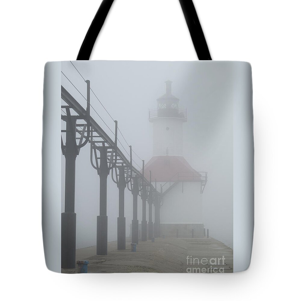 Lighthouse Tote Bag featuring the photograph Befogged by Ann Horn