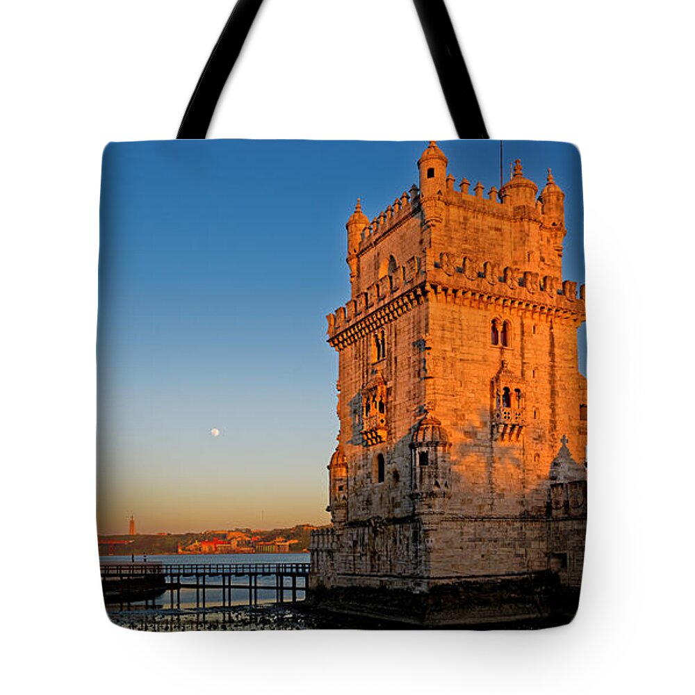 Lisbon Tote Bag featuring the photograph Belem Tower and the moon by Mark Rogers