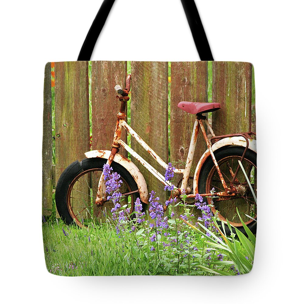 Orcas Island Tote Bag featuring the photograph Bike and Oar at Eastsound by Art Block Collections
