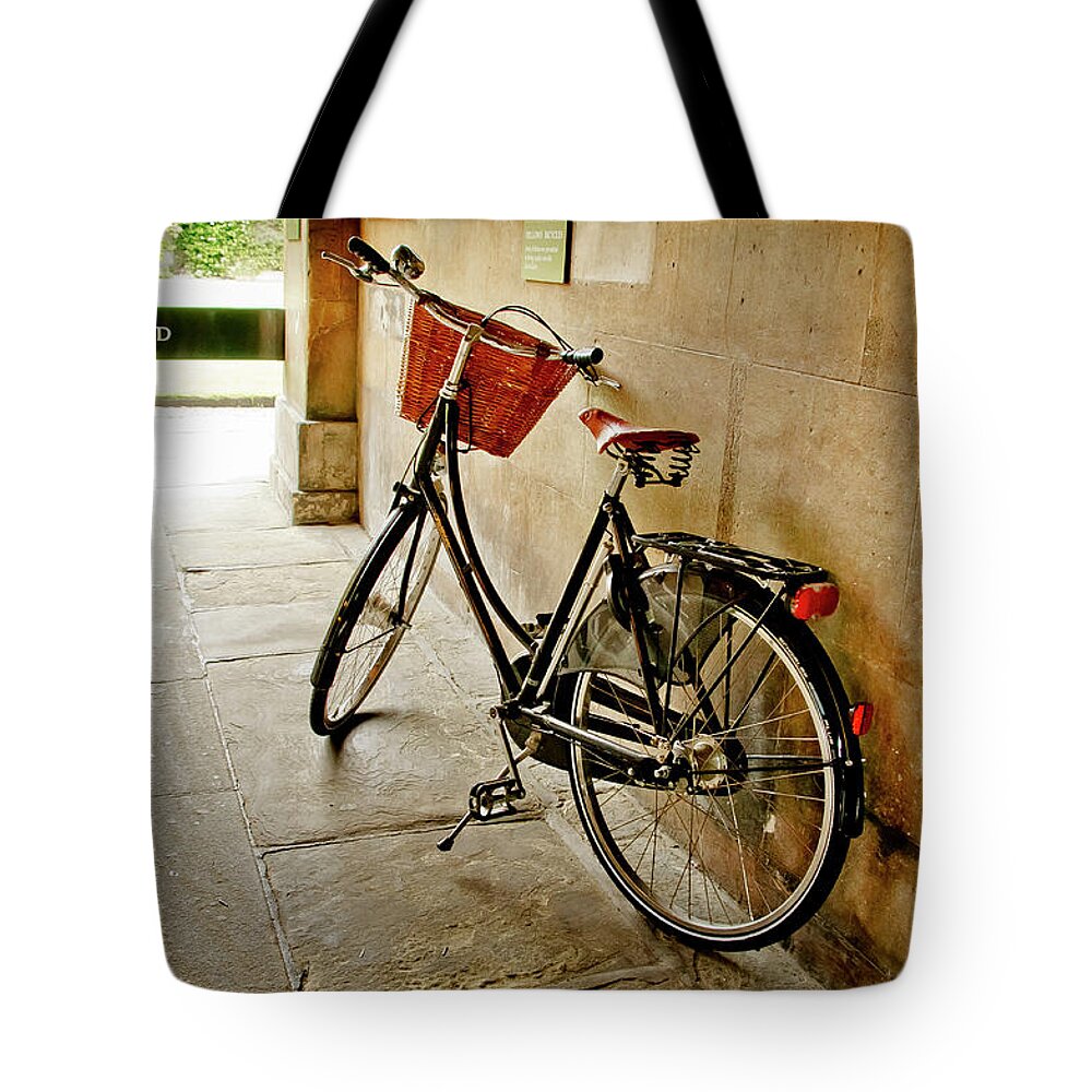 Christ's College Tote Bag featuring the photograph Bike at the school gate. by Elena Perelman