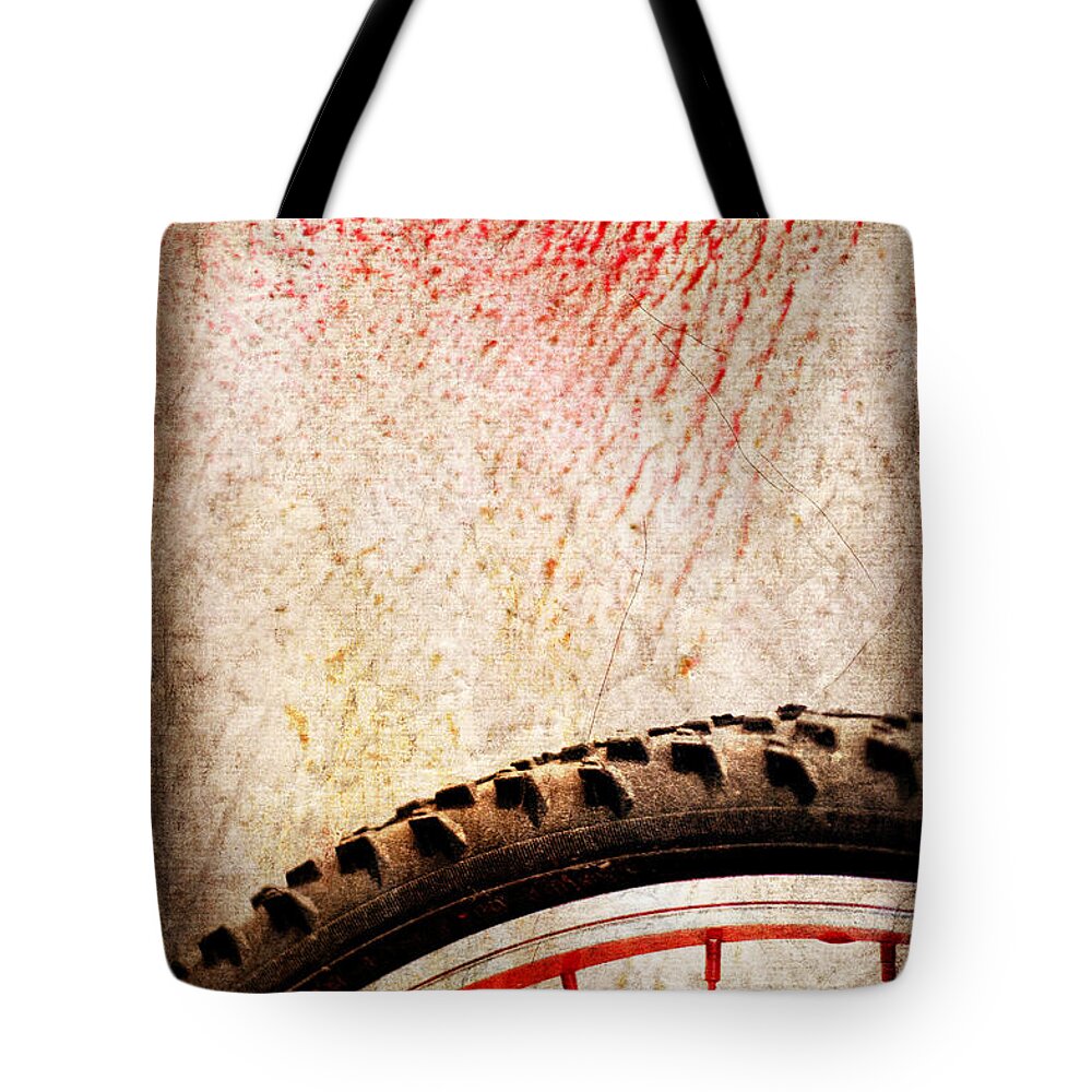 Abstract Tote Bag featuring the photograph Bike wheel Red spray by Silvia Ganora