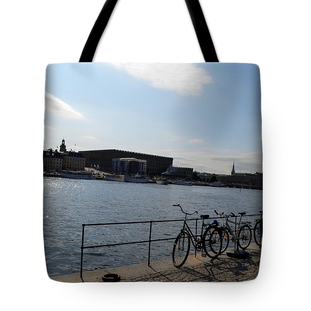 Bikes Tote Bag featuring the photograph Bikes in Stockholm by Erik Burg