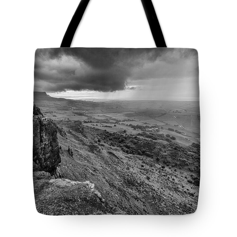Binevenagh Tote Bag featuring the photograph Binevenagh Storm Clouds by Nigel R Bell