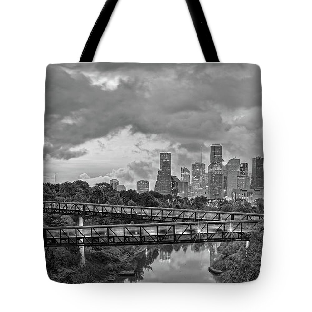 Downtown Tote Bag featuring the photograph Black and White Panorama of Downtown Houston and Buffalo Bayou from the Studemont Bridge - Texas by Silvio Ligutti