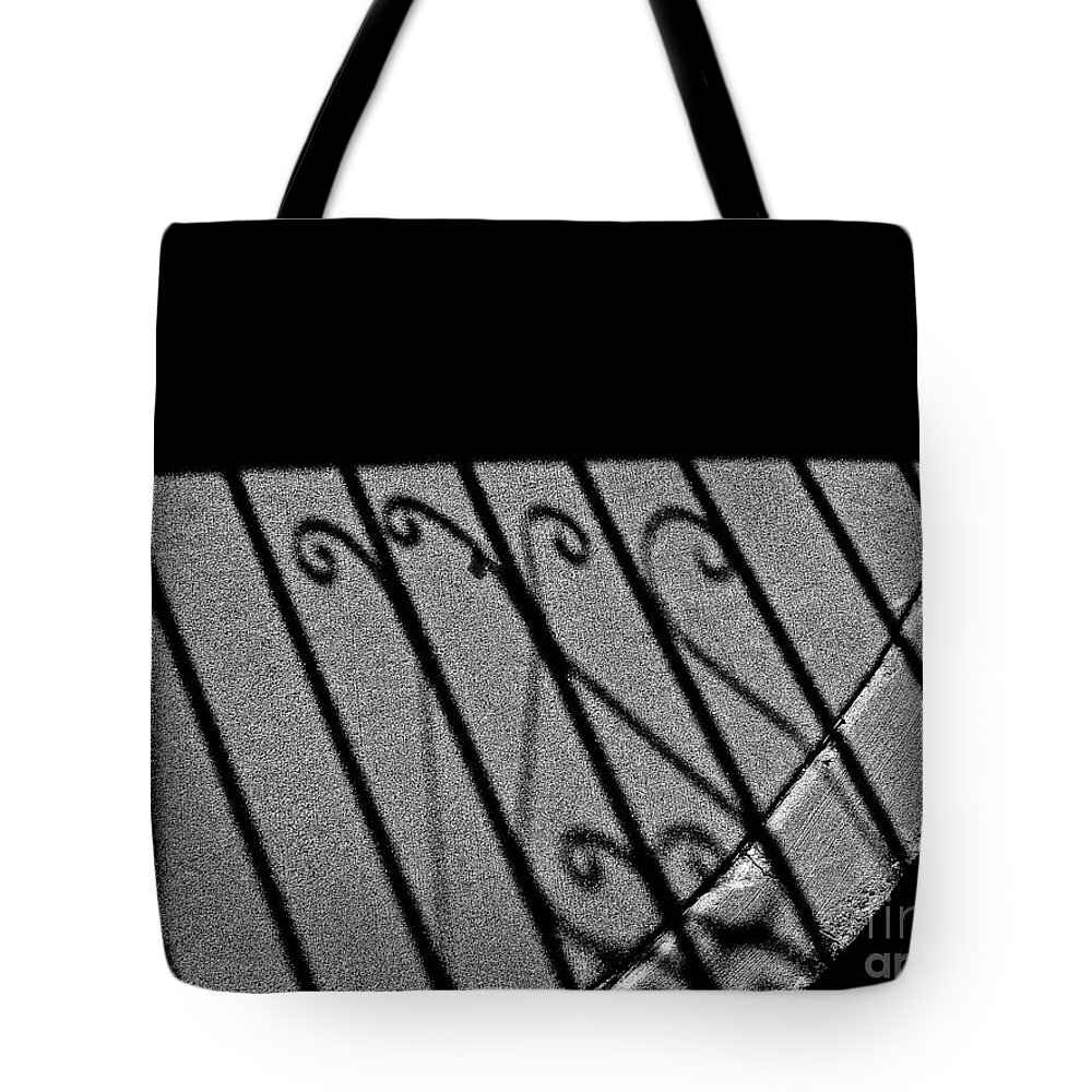 Abstract Tote Bag featuring the photograph Black and White Reach by Fei A