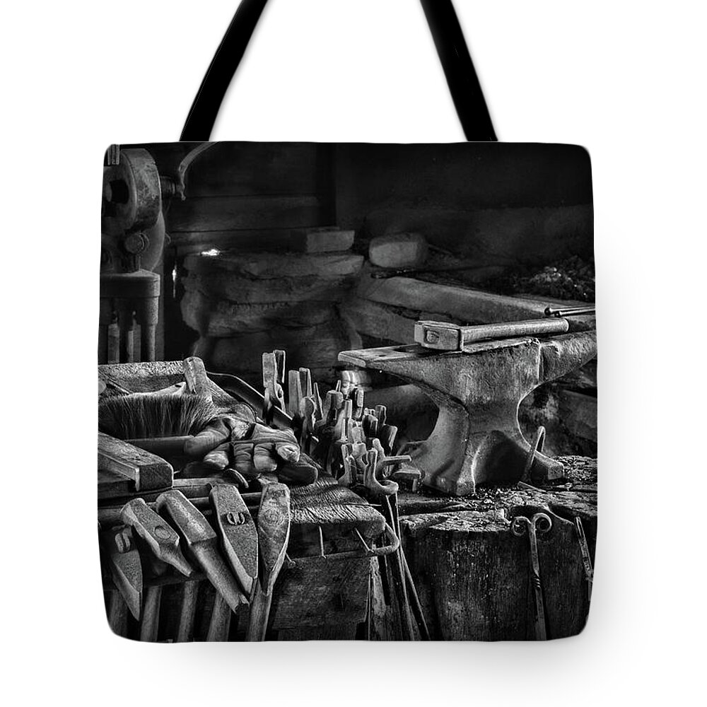 Paul Ward Tote Bag featuring the photograph Blacksmith-This is My Anvil Black and White by Paul Ward