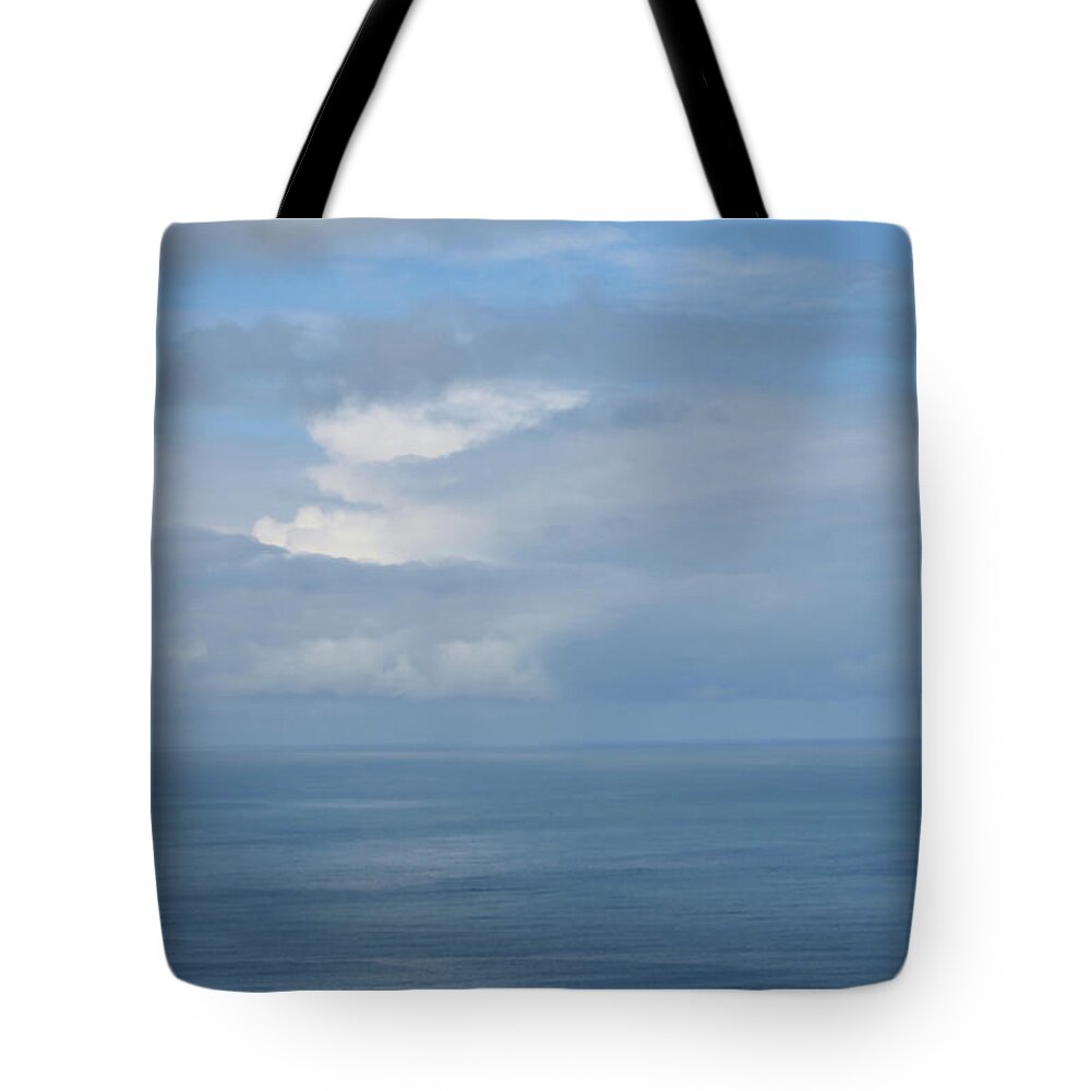 Blue Tote Bag featuring the photograph Blue Skies by JoAnn Lense