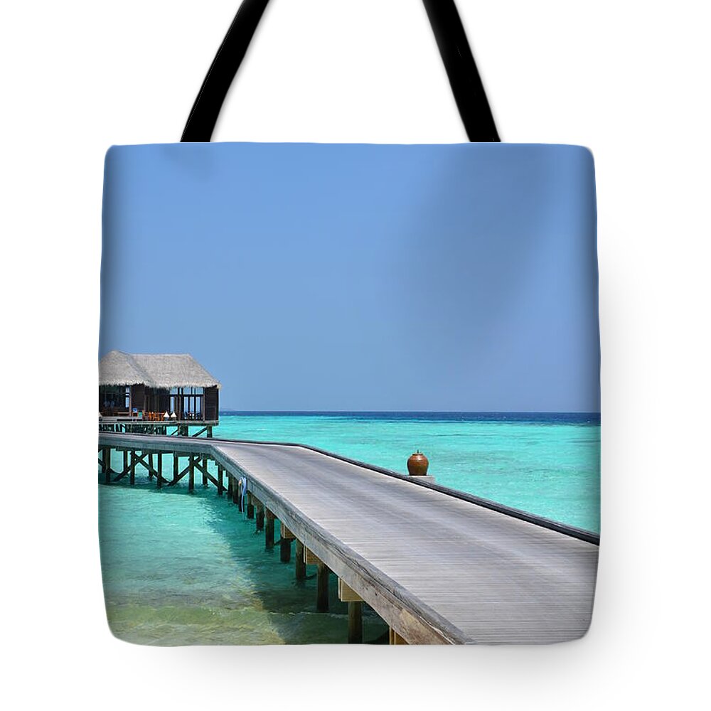 Maldives Tote Bag featuring the photograph Boardwalk in Paradise by Corinne Rhode