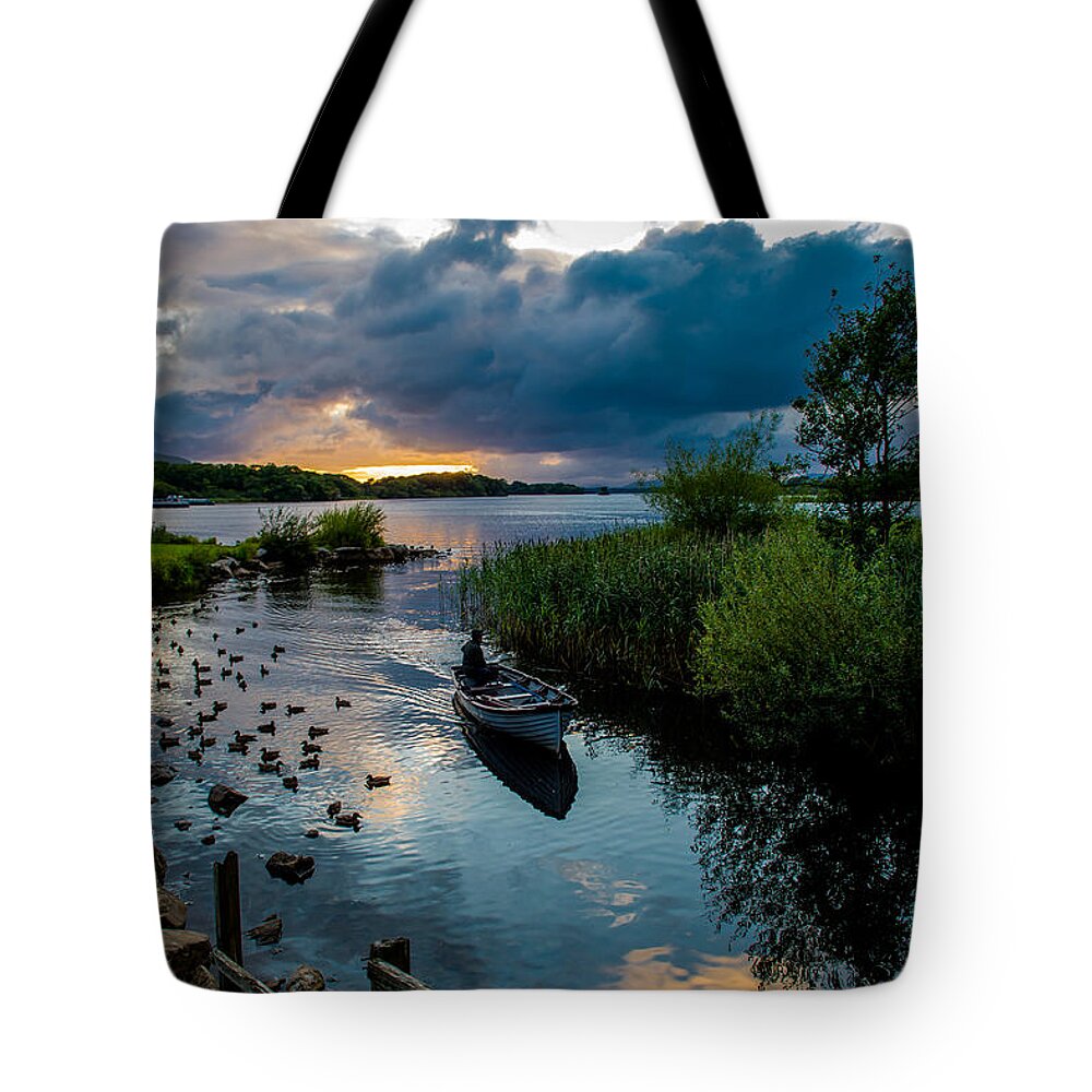 Lake Tote Bag featuring the photograph Boat in Killarney National Park In Ireland by Andreas Berthold