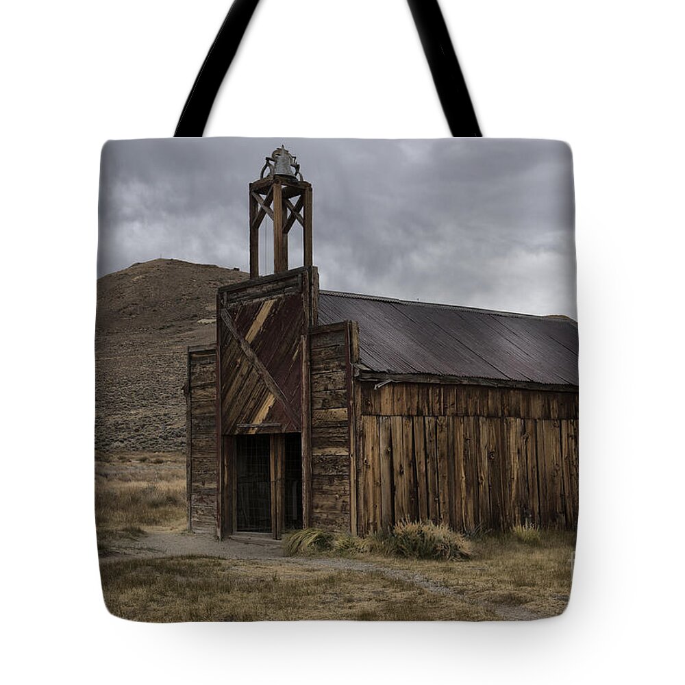 Sandra Bronstein Tote Bag featuring the photograph Bodie Fire Station with Lightning by Sandra Bronstein
