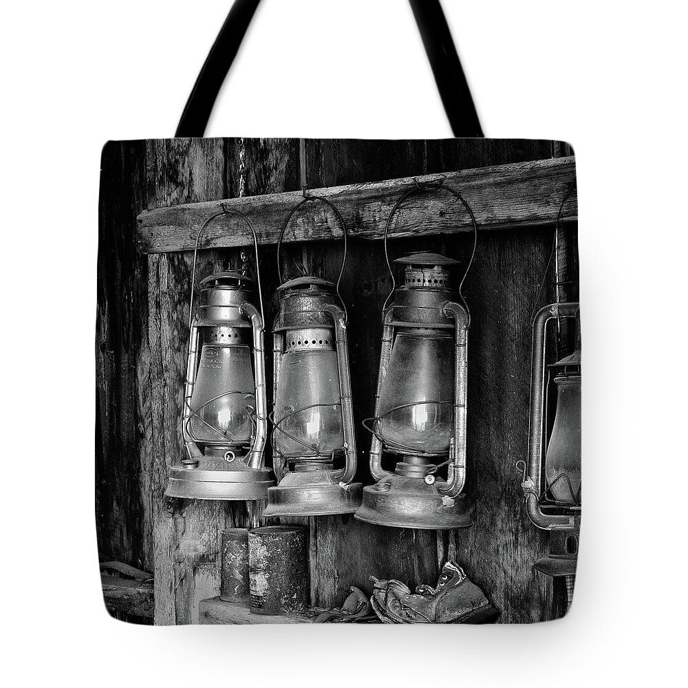 Bodie California Tote Bag featuring the photograph Bodie Lanterns by Tom Singleton