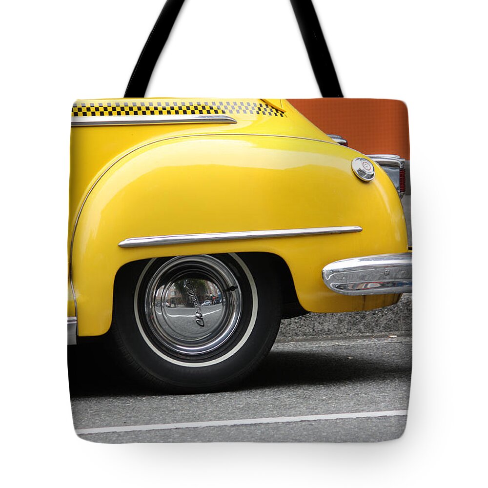 Toys Tote Bag featuring the photograph Bold rides hold by J C