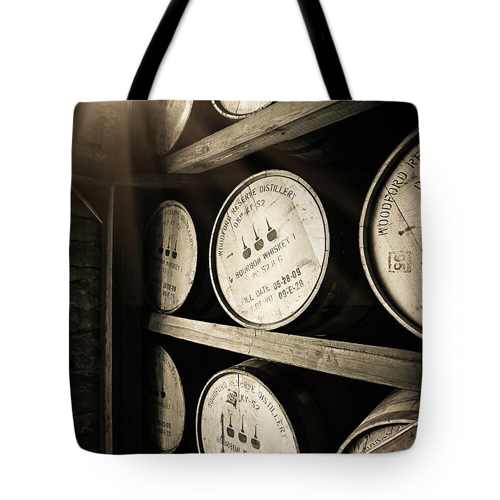 Bourbon Barrel Tote Bag featuring the photograph Bourbon Barrels by Window Light by Karen Varnas