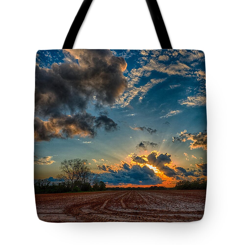 Sunset Tote Bag featuring the photograph Breaking Through by Brad Boland
