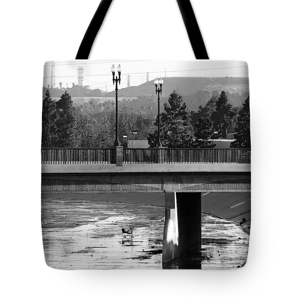 Bridge And Shopping Cart Tote Bag featuring the photograph Bridge And Shopping Cart by Viktor Savchenko