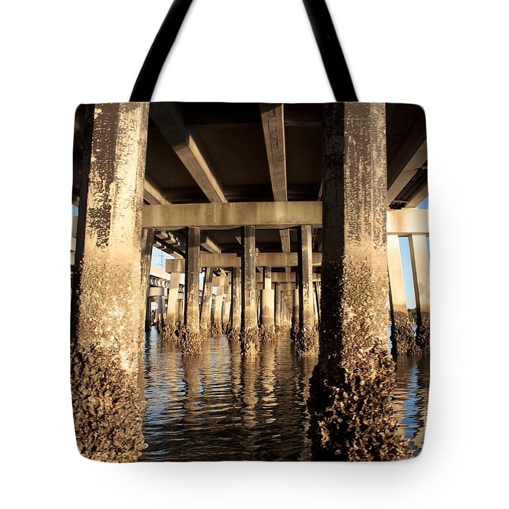 Architecture Tote Bag featuring the photograph Bridge Pilings by Thomas Marchessault
