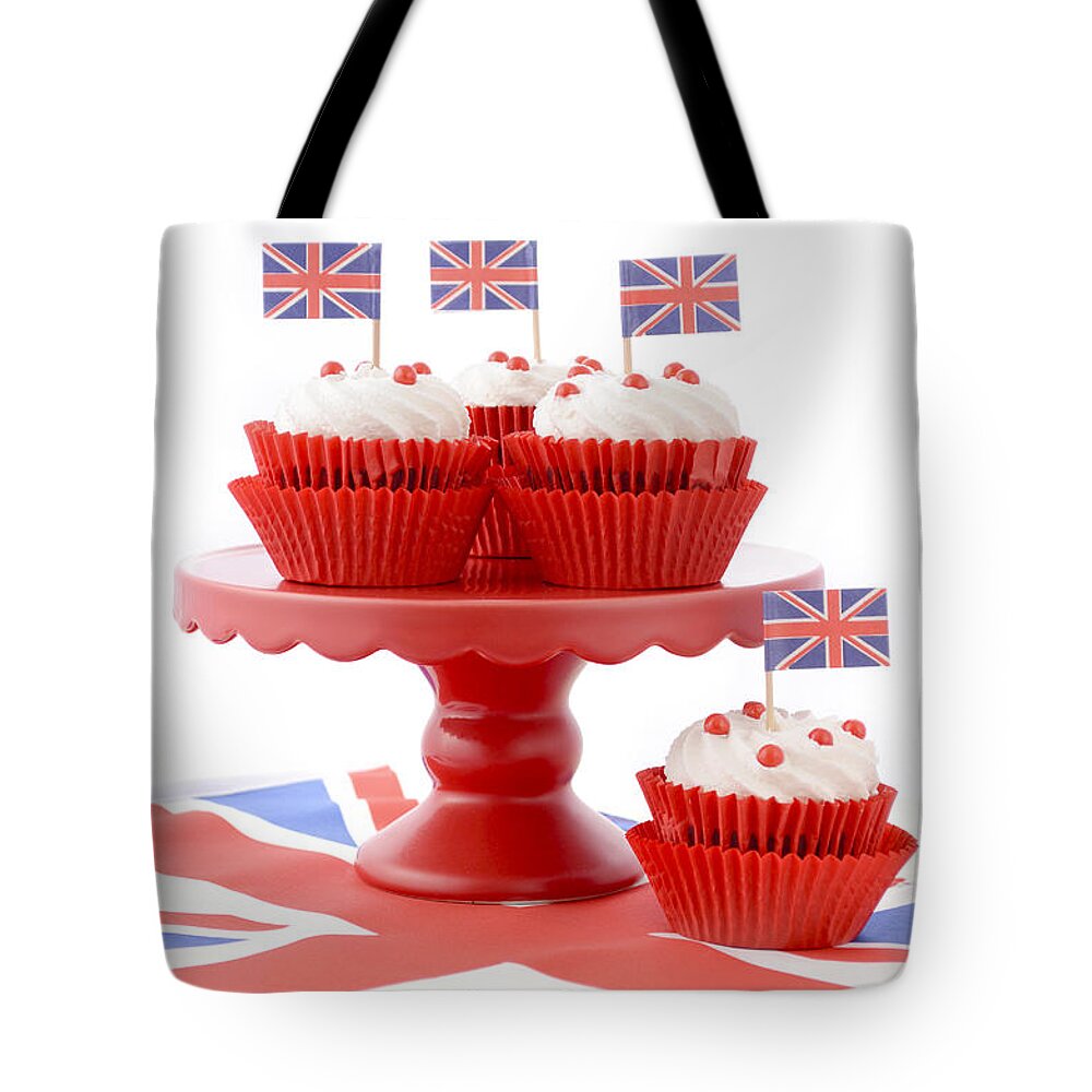 Afternoon Tea Tote Bag featuring the photograph British Cupcakes with Union Jack Flags by Milleflore Images