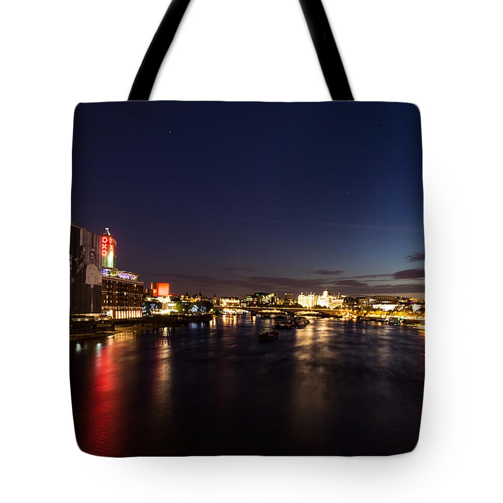 Georgia Mizuleva Tote Bag featuring the photograph British Symbols and Landmarks - Silky River Thames at Night Complete with the Royal Family by Georgia Mizuleva