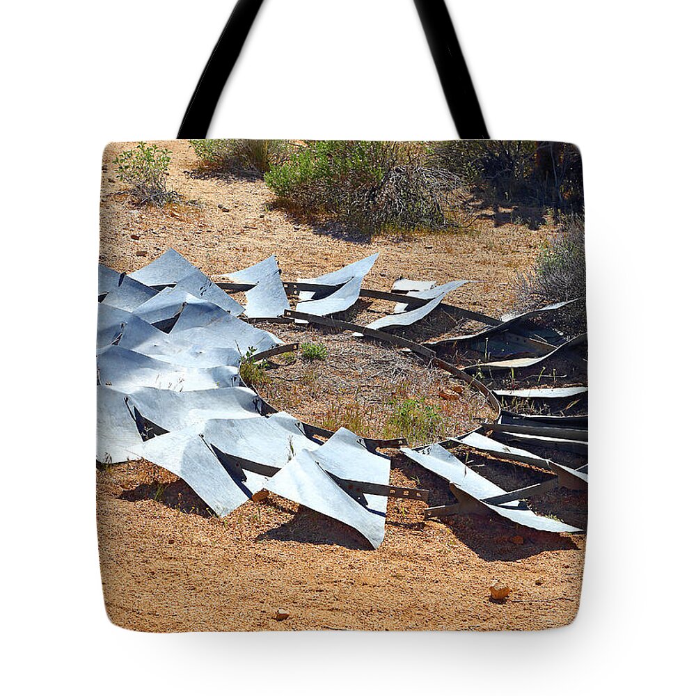 Broken Wheel Of Fortune Tote Bag featuring the photograph Broken Wheel Of Fortune by Viktor Savchenko