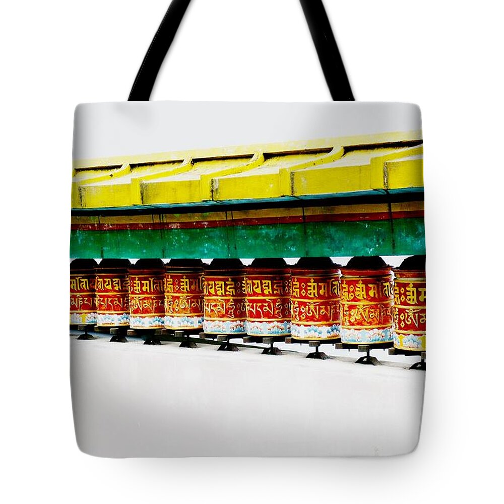 Photography Tote Bag featuring the photograph Buddhist Prayer Wheelz by Piety Dsilva